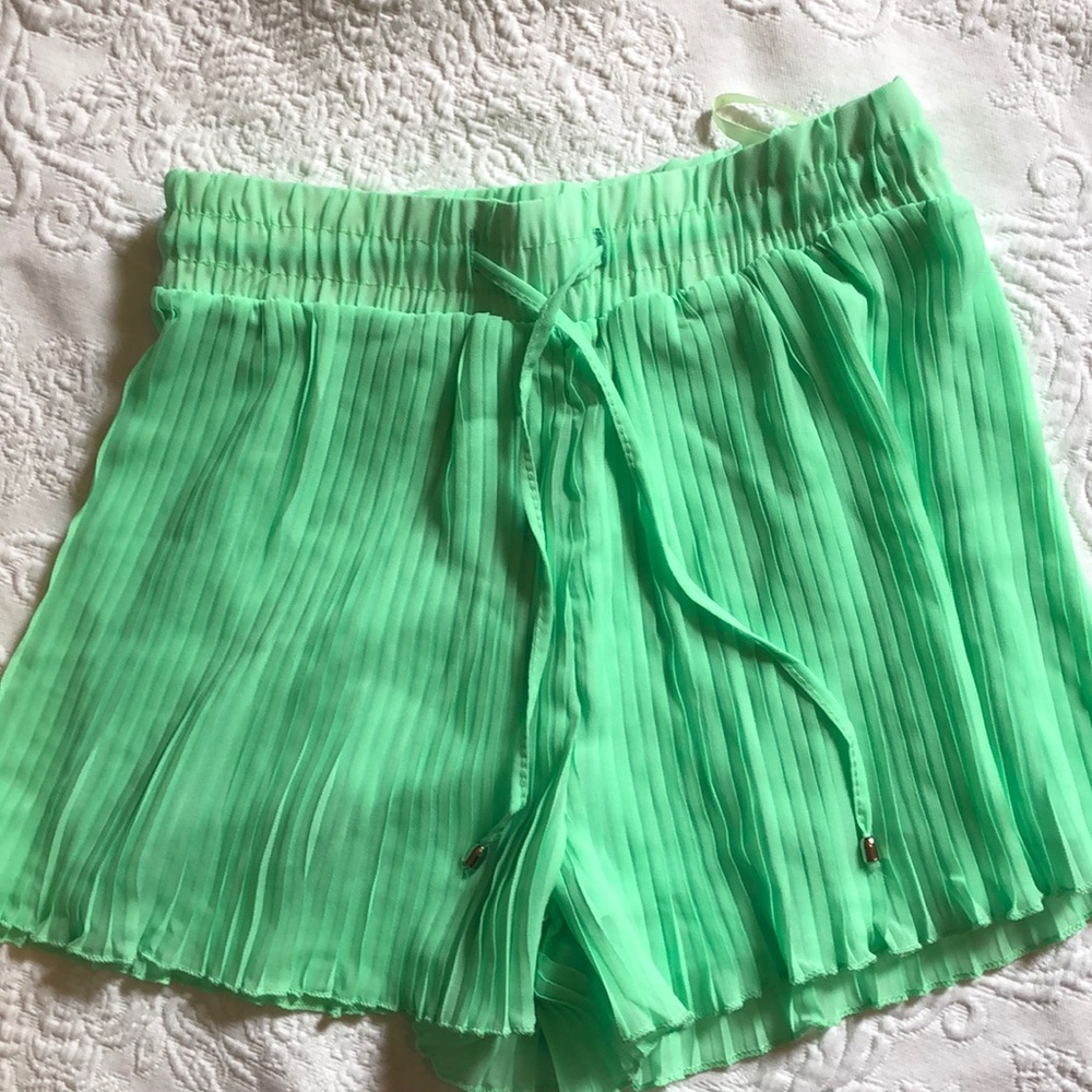Lime green pleated shorts size medium